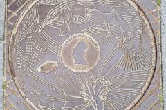 Kloakdæksel med HC Andersen motiv